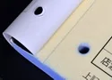 ミシン加工。控えを残したい伝票にミシンを入れて切り離せるようにする加工