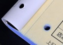 ミシン加工。控えを残したい伝票にミシンを入れて切り離せるようにする加工