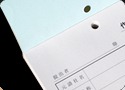 天のり製本。1枚ものの伝票を一辺で糊付け製本